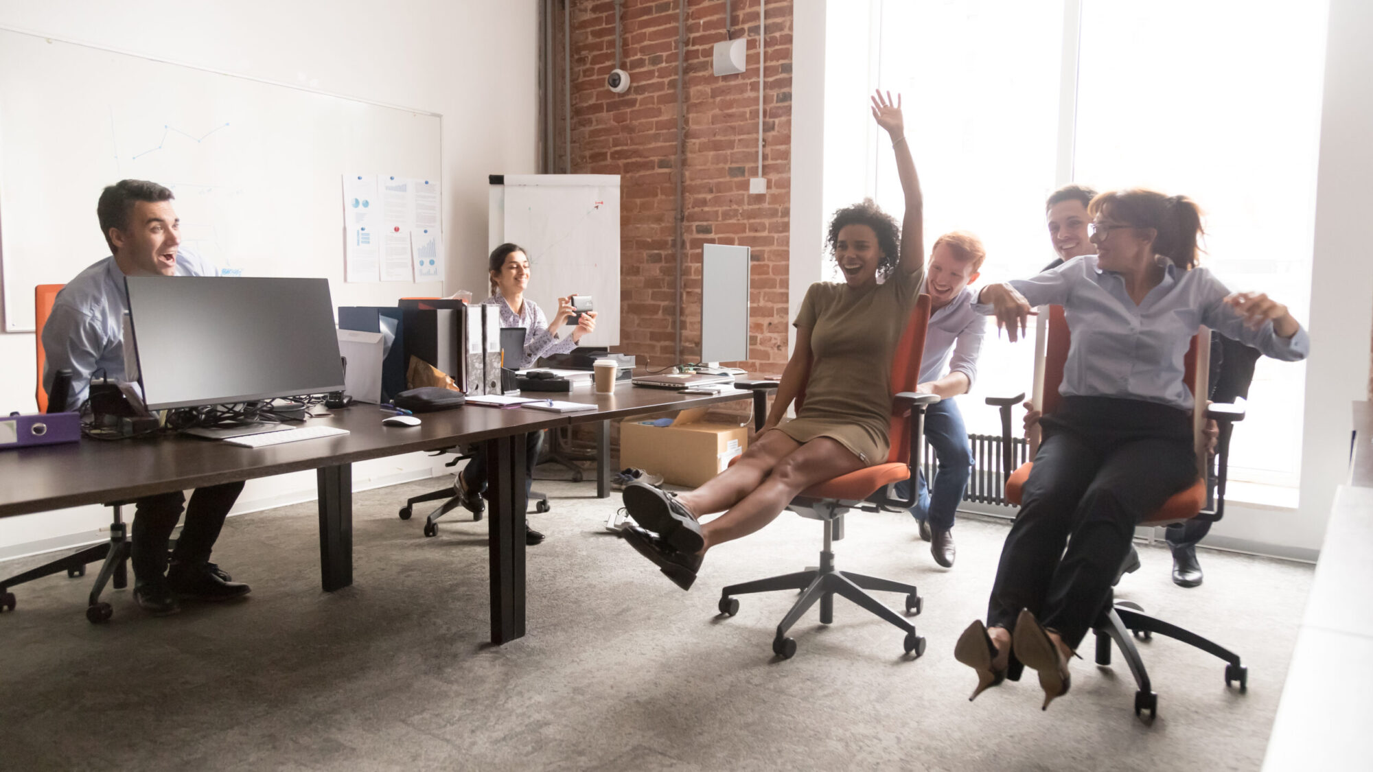 coworkers celebrating at desk