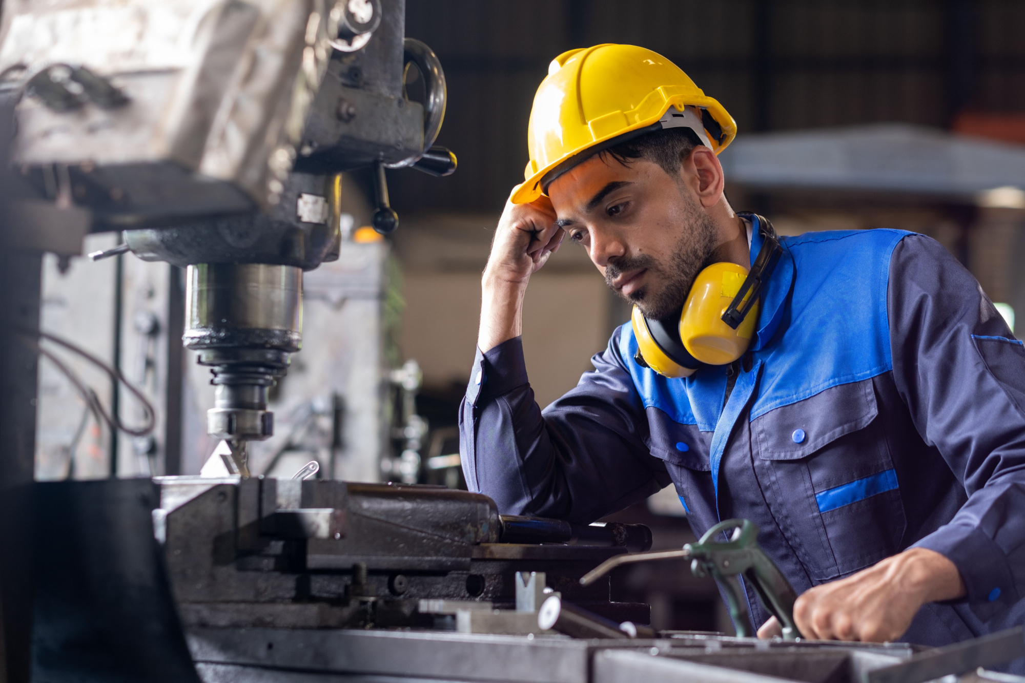 tired worker in safety gear