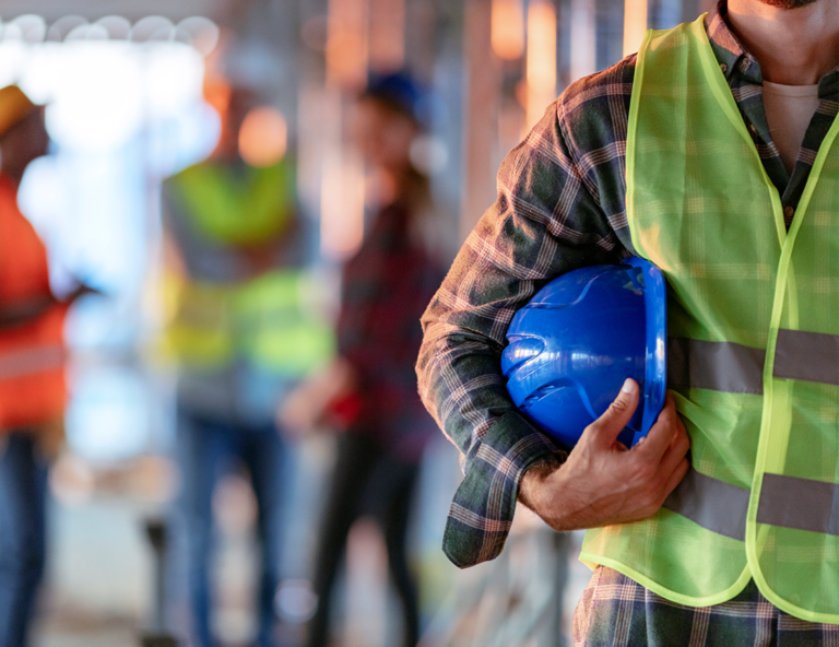 worker-holding-hard-hat