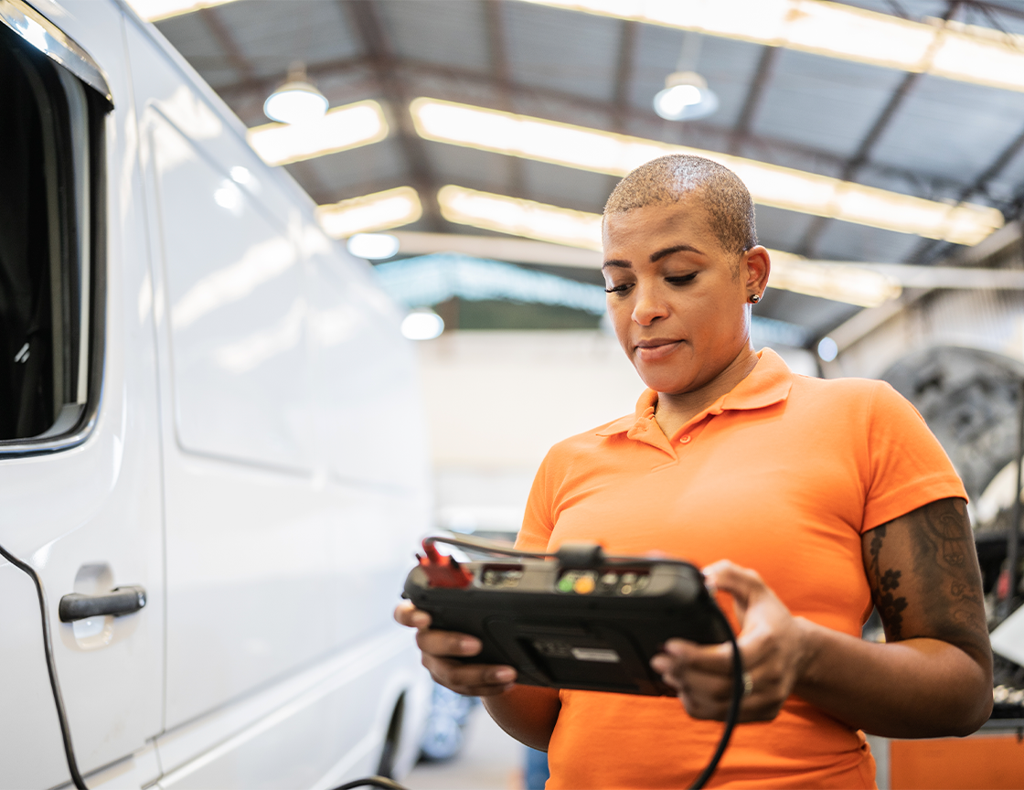 women-in-warehouse-using-a-device