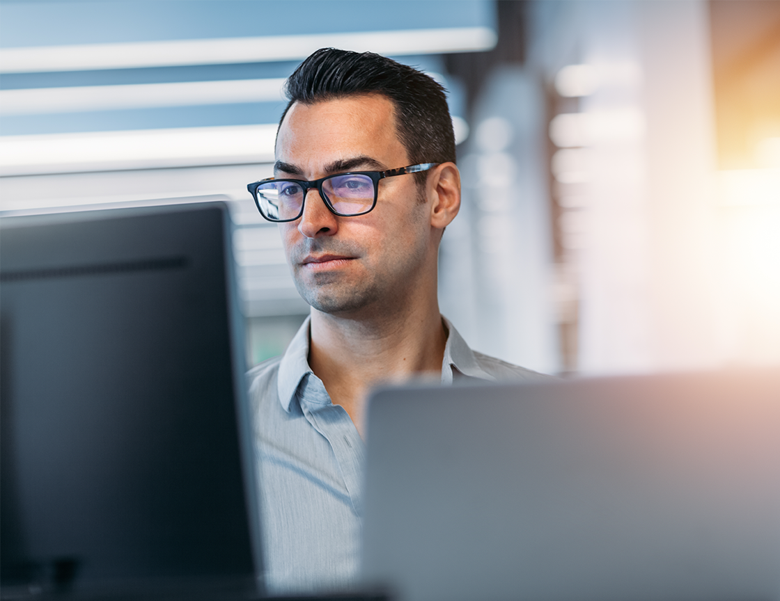 man-wearing-eye-glasses-looking-at-computer