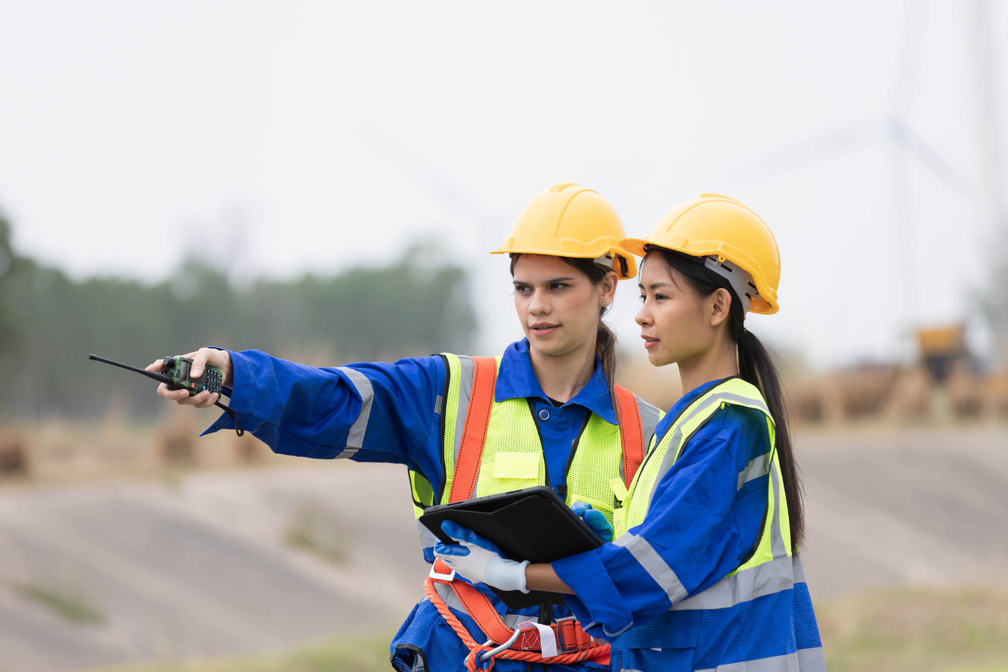 two safety workers reporting an incident with radio and electronic device