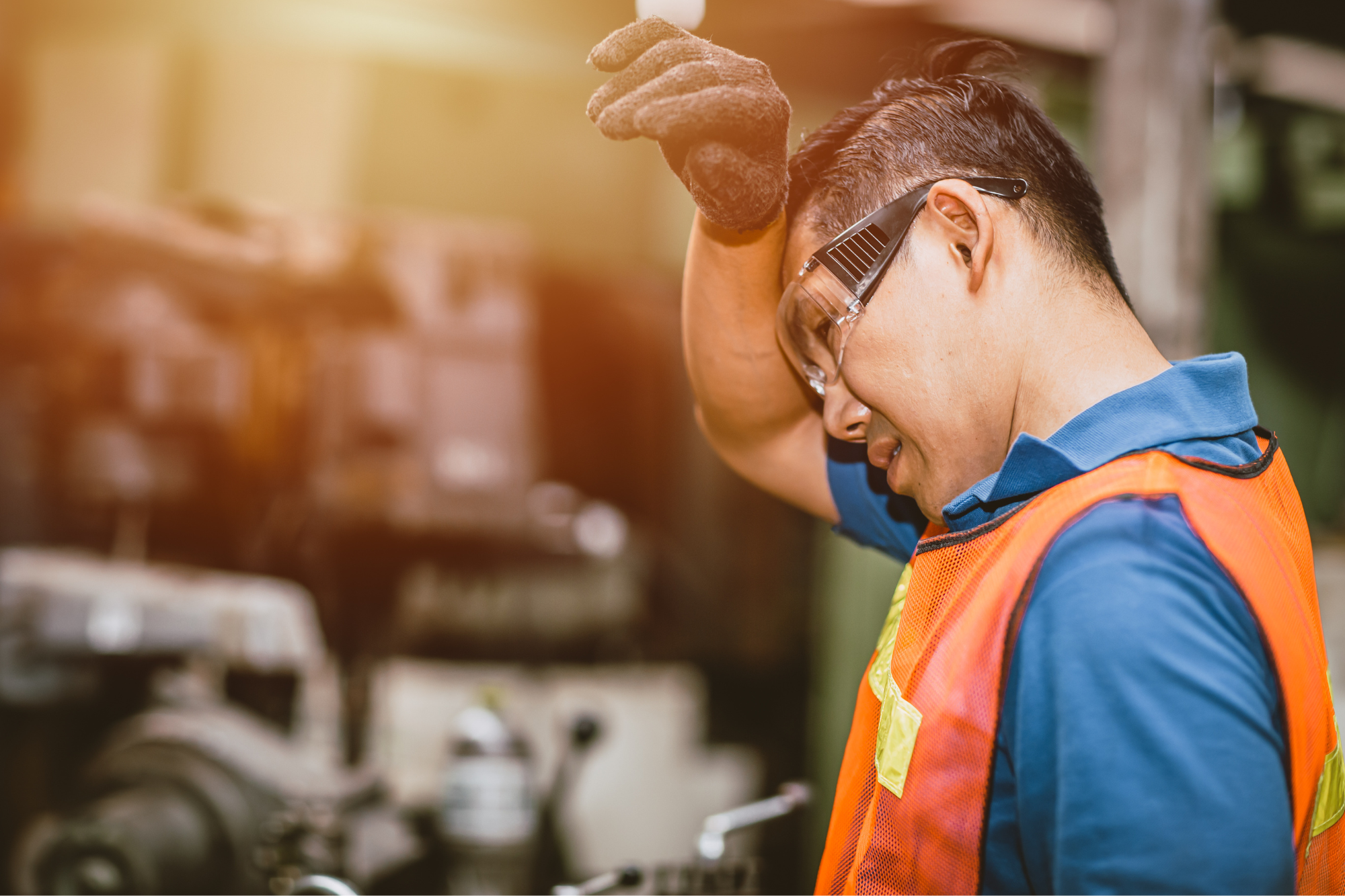 man suffering from heat exhaustion while at work