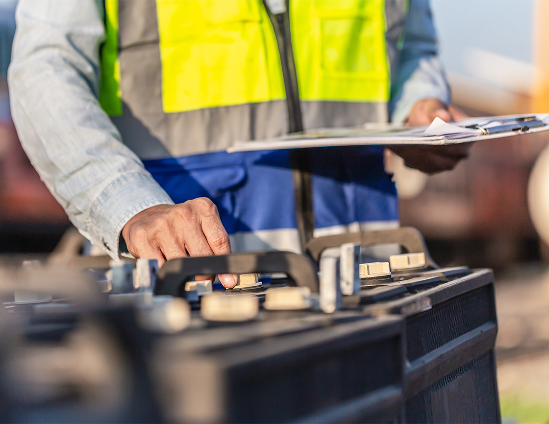 Man-inspecting-equipment