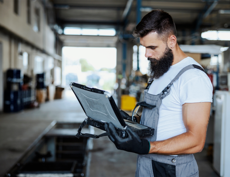 safety-professional-using-a-laptop-in-the-field