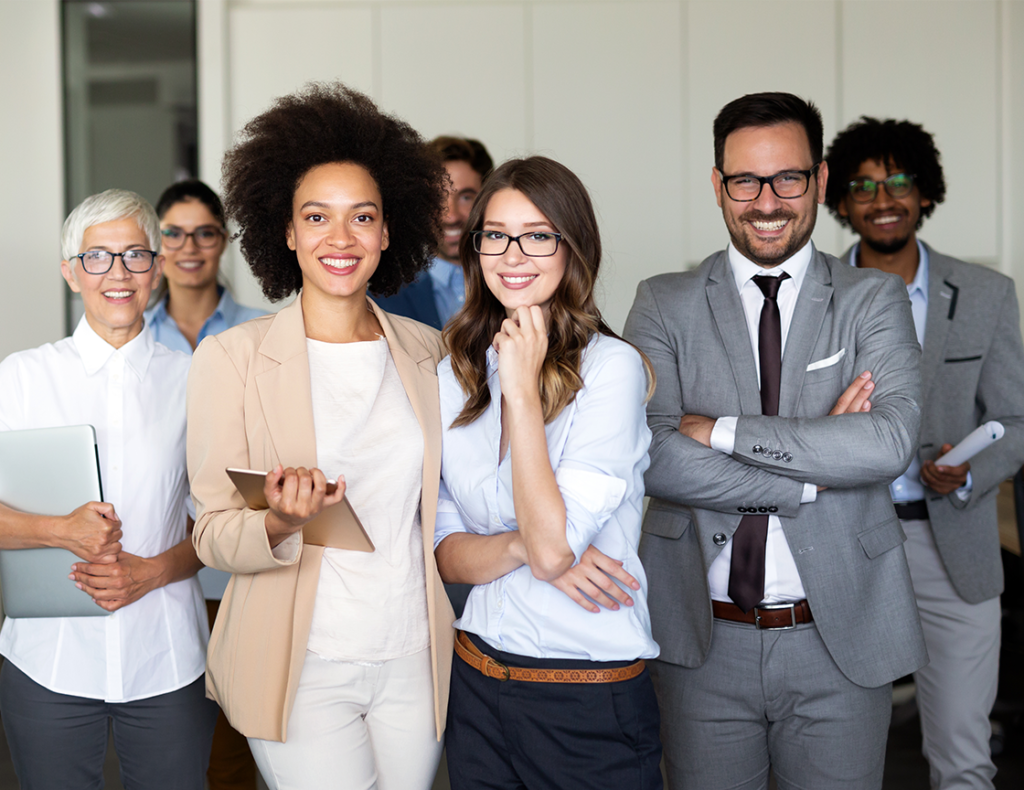 group-of-professionals-smiling-at-camera