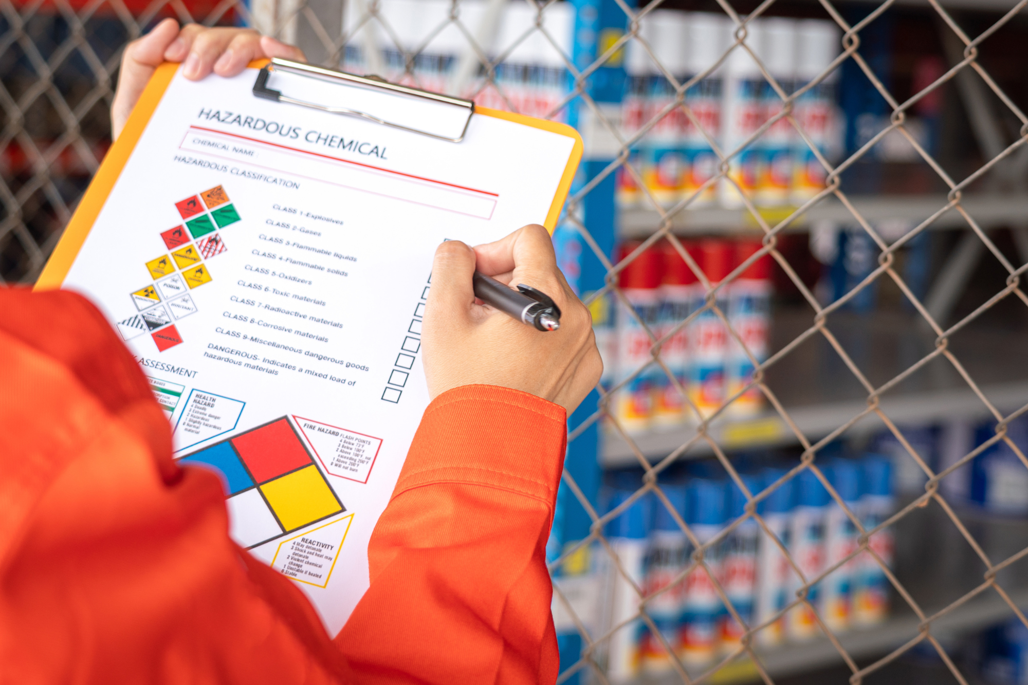 worker using a chemical safety checklist