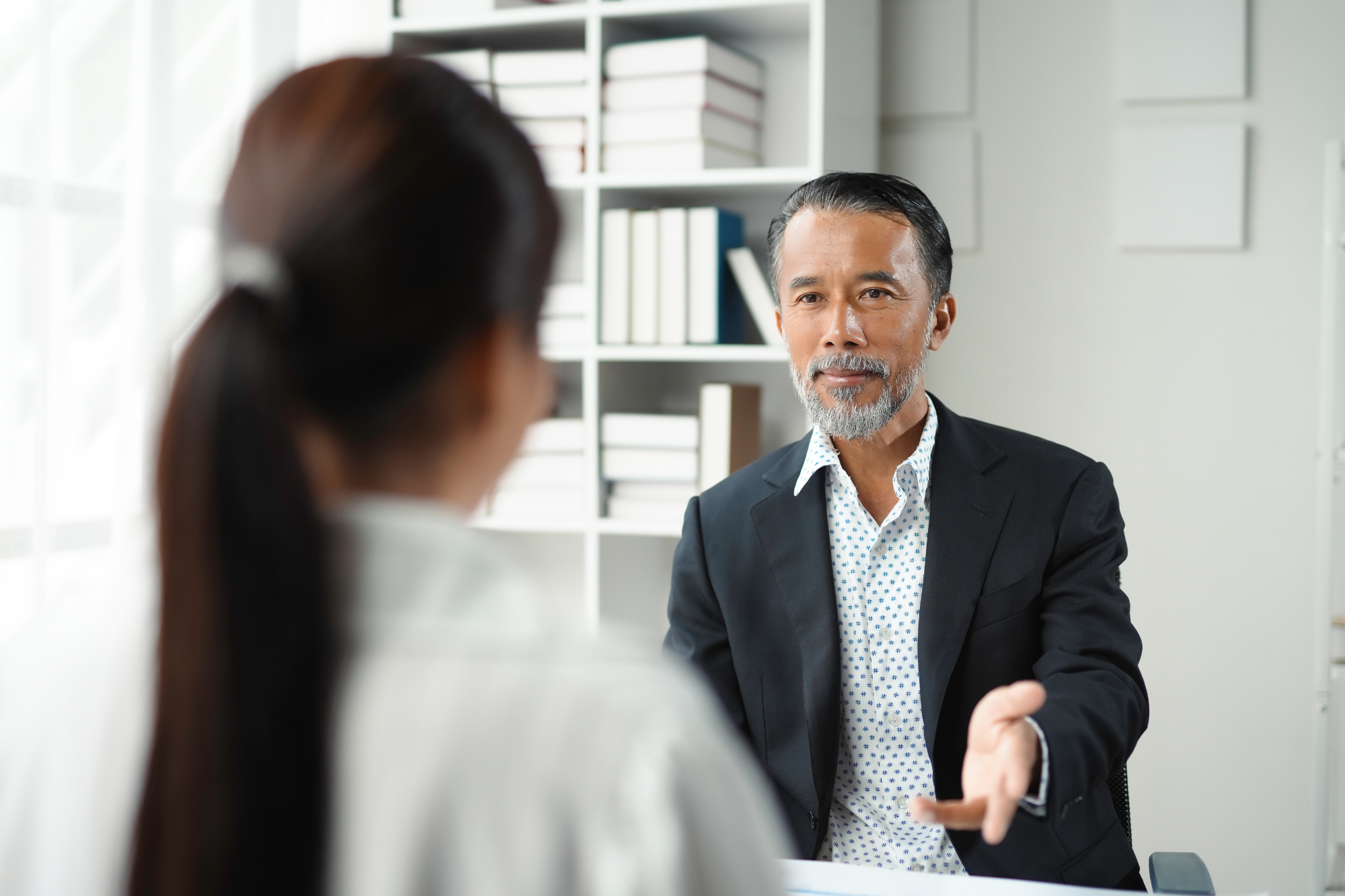 man and woman having a professional discussion